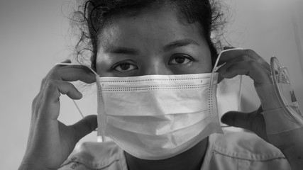 Sick women of corona virus wearing mask protection and recovery from the hospital