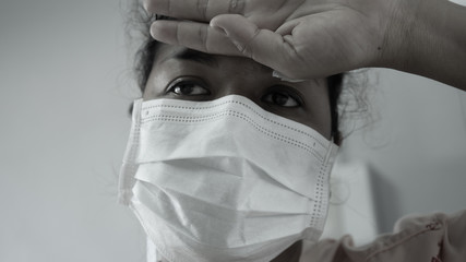 Sick women of corona virus wearing mask protection and recovery from the hospital