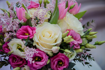 bouquet of flowers with wedding rings