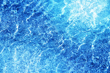 Photo background of bright transparent sea water