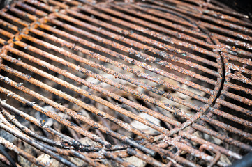 rusty grill rust over coal residues