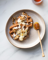 vegan sugar free buckwheat waffles, with walnut on marble background