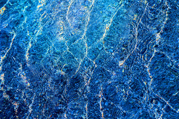 Photo background of bright transparent sea water