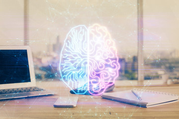 Multi exposure of work space with computer and human brain hologram. Brainstorm concept.