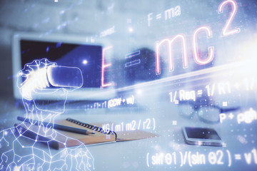 Desktop computer background and formula hologram writing. Double exposure. Education concept.