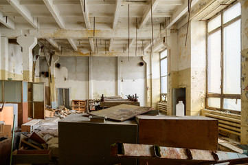 Photo of a garbage dump in a slum in an abandoned factory building