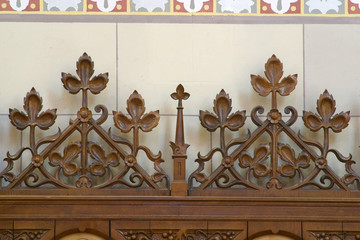 Bench with decorated wood carvings at St. Francis Church in Zagreb, Croatia