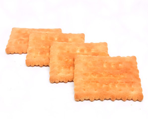 Stack of sweetmeal digestive biscuits isolated on white.

