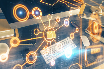 Computer on desktop with social network theme icon. Multi exposure. Concept of international connections.