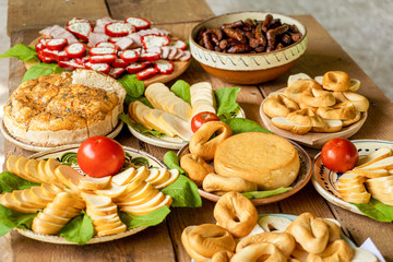 Cheese from local Romanian farmers on traditional clay pottery handmade for a local brunch