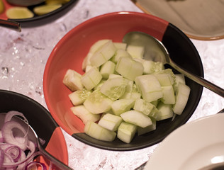 Slices of green fresh cucumber vegetables  on a plate