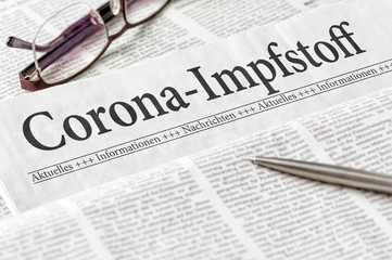 Zeitung mit der Überschrift Corona-Impfstoff