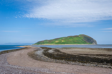Low tide connection to Davaar island. Campbeltown, Scotland