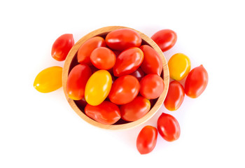 Cherry tomatoes in wood bowl isolated on white background, food healhty concept