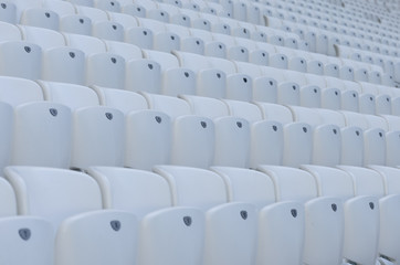 Empty white seats in the stadium before the match