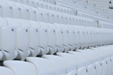 Empty white seats at the stadium during isolation period