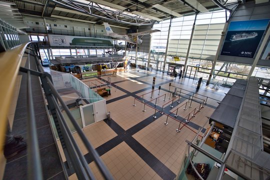 Airport Insight the airport terminal of Airport Rostock Laage due to the Coronavirus COVID-19 corona crisis pandemic, the airport is empty, total shutdown - hall without passenger
