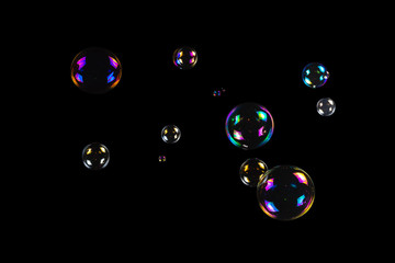 Soap bubbles isolated on a black background.