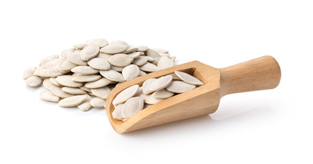 Pumpkin seeds on the white background