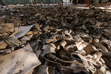 Gasmasks lying on tthe ground in abandoned school in Pripyat near Chernobyl in Ukraine
