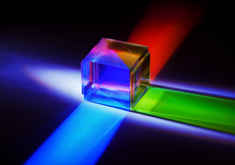 a crystal cube reflects colored rays - obrazy, fototapety, plakaty