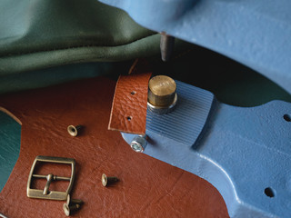 Genuine Leather. Sewing a purse. Leather work. Tools for sewing bags, wallets, clutches. Stitching....