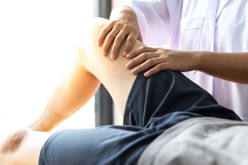Professional therapists are stretching muscles, patients with abnormal muscular symptoms, physical rehabilitation therapies and treatment of physiological disorders by physiotherapists concept.