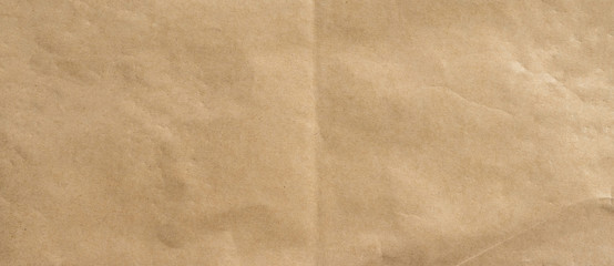 crumpled brown paper background and texture with copy  space.