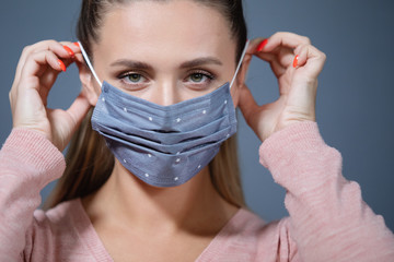 Woman in medical mask. Coronavirus. Covid-19. 2019-ncov.