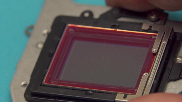 camera repair, camera sensor for a digital camera close-up, matrix. camera repair, dirty matrix for DSLR camera