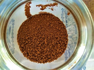 ground coffee in glass jar