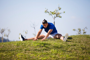 Fototapeta na wymiar Young man exercising outdoor