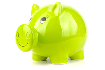 Green, green piggy bank isolated on a white background. Budget saving concept.