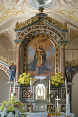 Fototapeta na wymiar Saint Martin, main altar in the Saint Martin's Parish Church in Hrnetic, Karlovac, Croatia