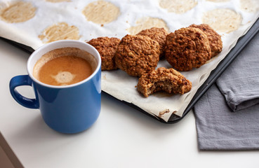 oat cookies and cup of coffee on the table