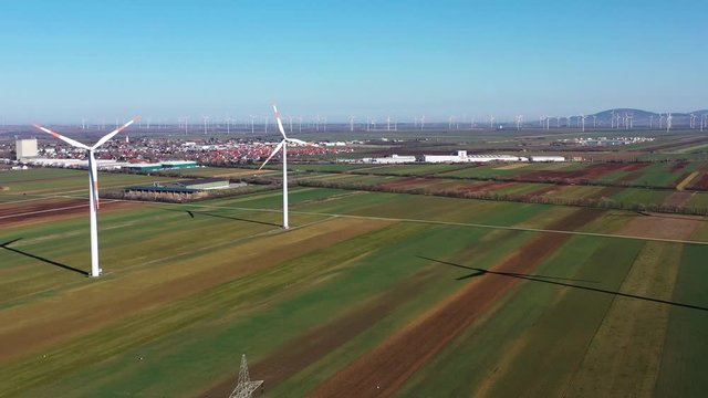 aerial footage of wind turbines on austria hungarian border on A4 autobahn a part of E60 road