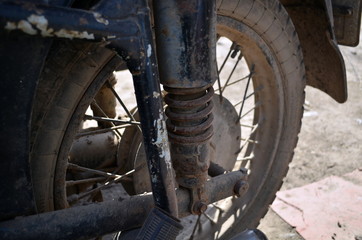 Fototapeta na wymiar old black motocycle dnepr-11 rear suspension