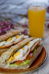 sandwiches with orange juice