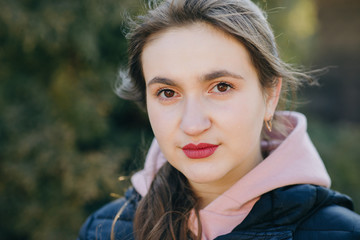 Naklejka premium Girl Takes Off Medical Mask During Coronavirus COVID-19 Epidemic. Breathes deeply and smiling looking at camera. Health care and medical concept.