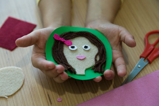 making teacher,student or mother and daughter pictures with felt,wool and carton  for children&rsquo;s activities in preschool or nursery.creative ideas.back to school and happy teachers day concept