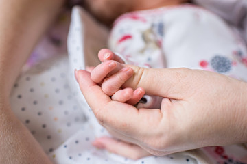 baby, child, newborn, hand, mother, care, small, love, infant, holding, cute, hands, family, white, boy, human, finger, feet, foot, parent, sleeping, new, kid, mom, people.  mothers Day