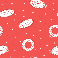Seamless pattern with polka dot inflatable lifebuoys.