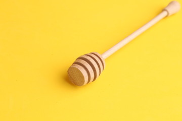 honey stick in color background