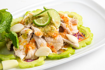 spicy and sour pork eat with bitter melon closeup shot