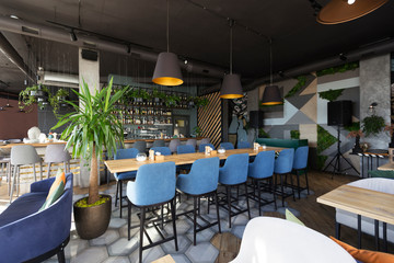 Bar counter with alcohol bottles assortment, Barroom in restaurant