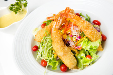 deep fried shrimps salad mixed vegetable serve with cream salad