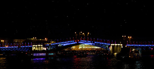 Saint Petersburg drawbridge with neon lighting at night