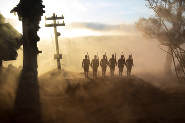 War Concept. Military silhouettes fighting scene on war fog sky background, World War Soldiers...