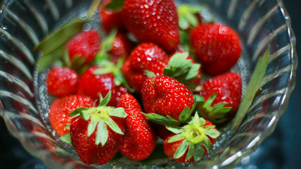 Group of strawberry in glass bowl  Red colour fruit