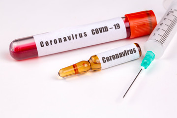 Vaccine concept for new Corona Virus Outbreak from China, Wuhan. Immunisation Vaccination for Pandemic Coronavirus in Medical Bottle storage and medical Syringe.